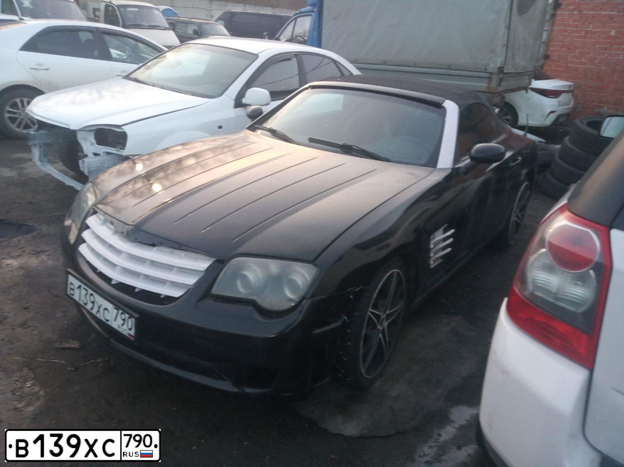 Фото автомобиля CHRYSLER CROSSFIRE, 2005 — госномер В139ХС790. Цвет: ЧЕРНЫЙ