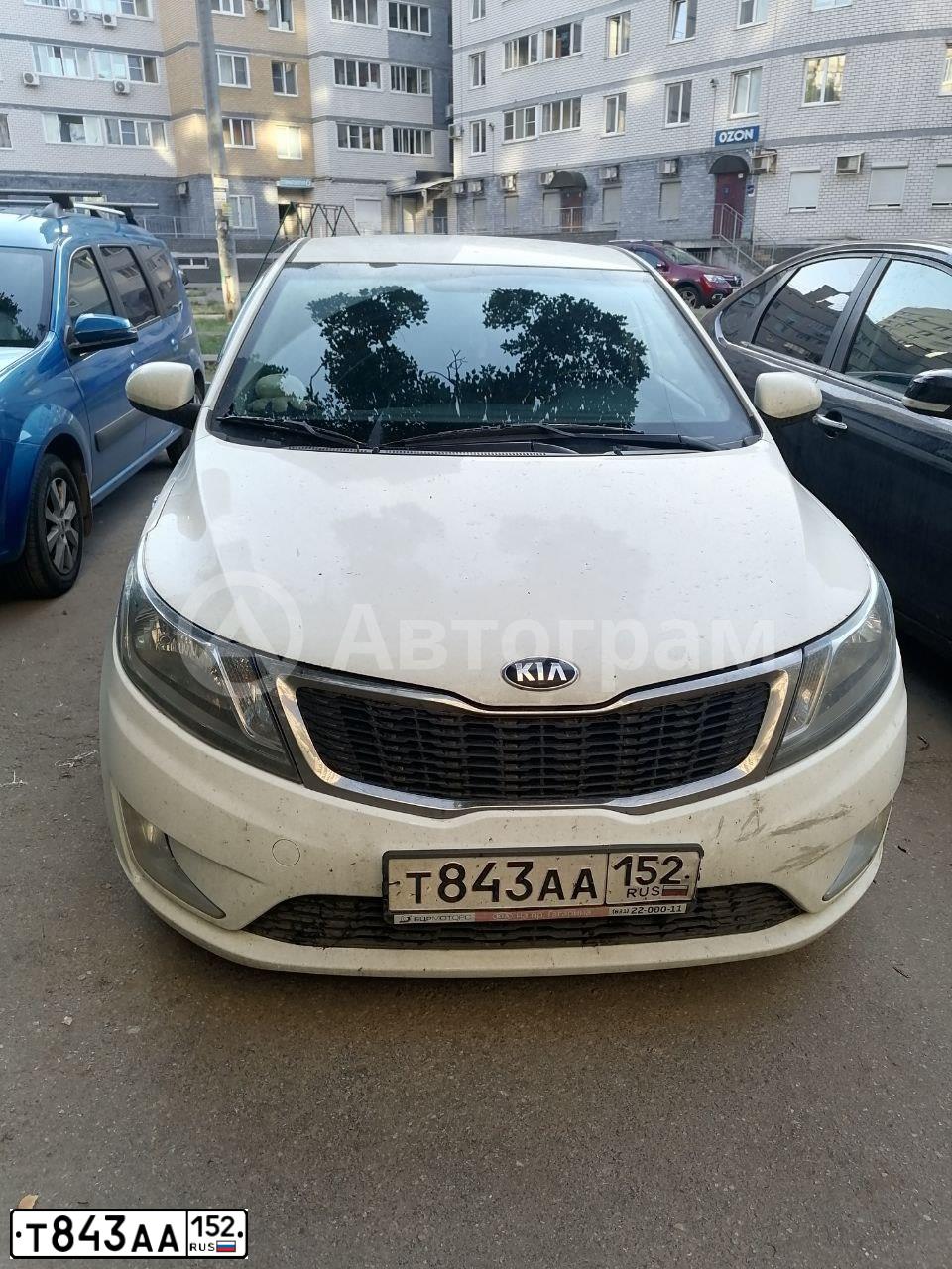 Фото автомобиля KIA RIO, 2014 — госномер Т843АА152. Цвет: Белый