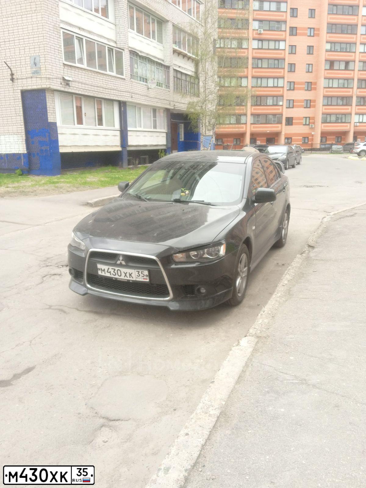 Фото автомобиля MITSUBISHI LANCER, 2012 — госномер М430ХК35. Цвет: ЧЕРНЫЙ