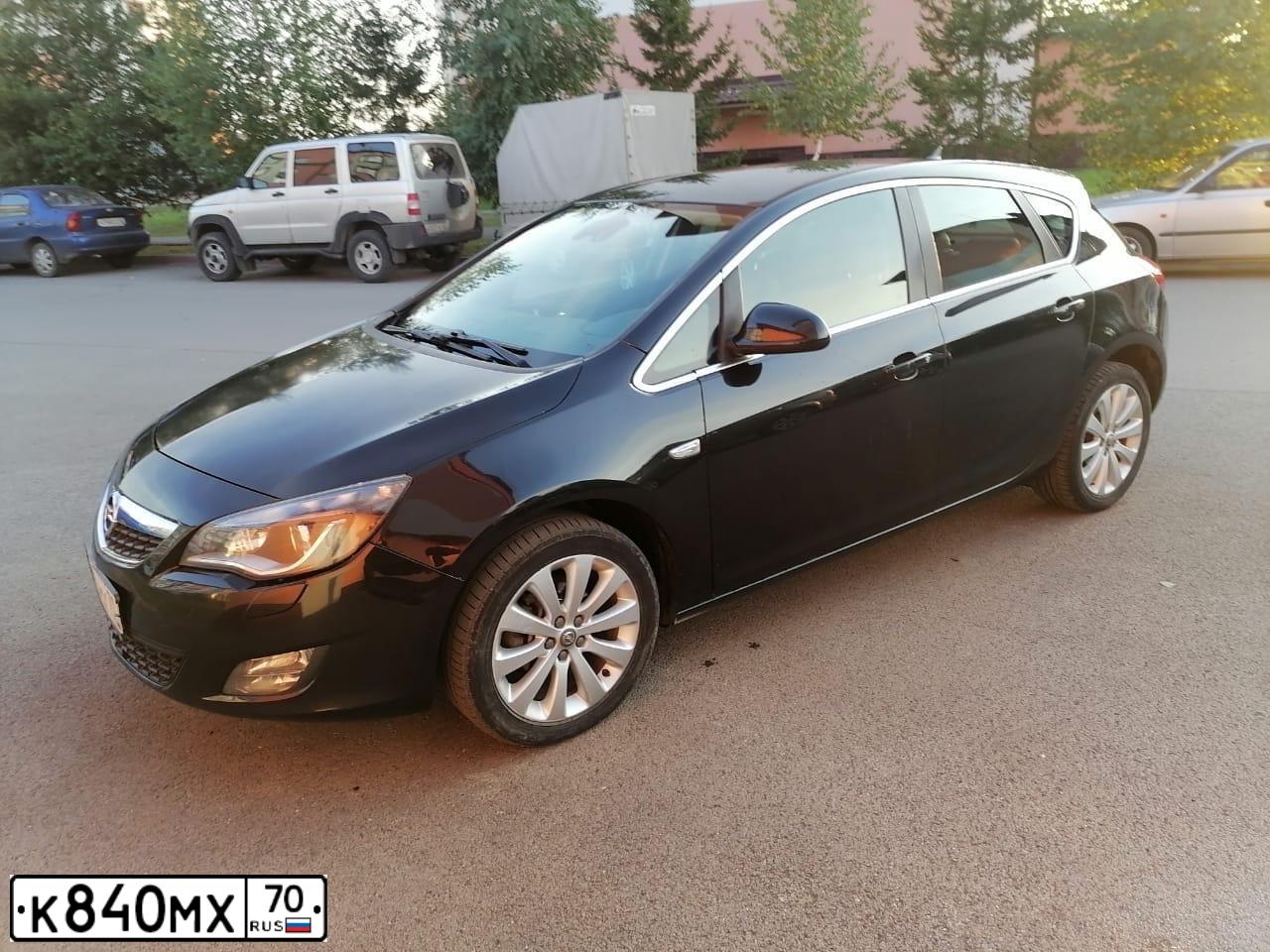 Фото автомобиля OPEL ASTRA, 2011 — госномер М102НН142. Цвет: ЧЕРНЫЙ МЕТАЛЛИК