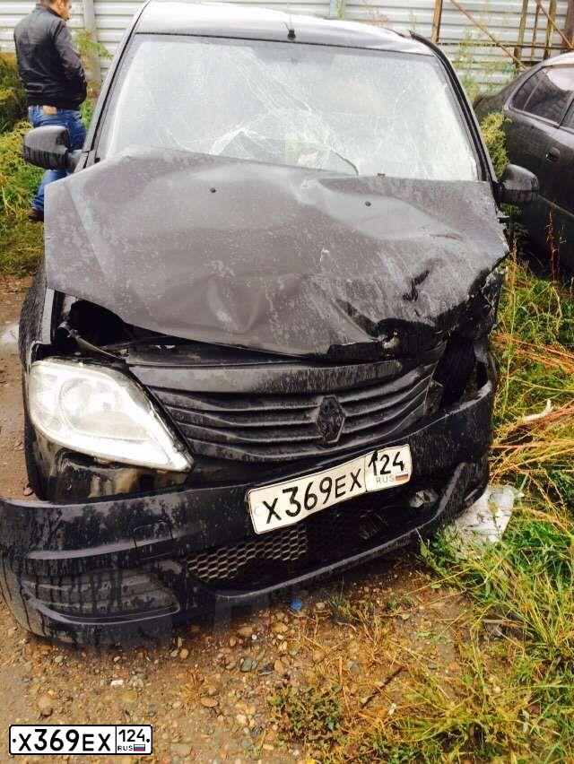 Фото автомобиля RENAULT LOGAN, 2012 — госномер Х369ЕХ124. Цвет: ЧЕРНЫЙ