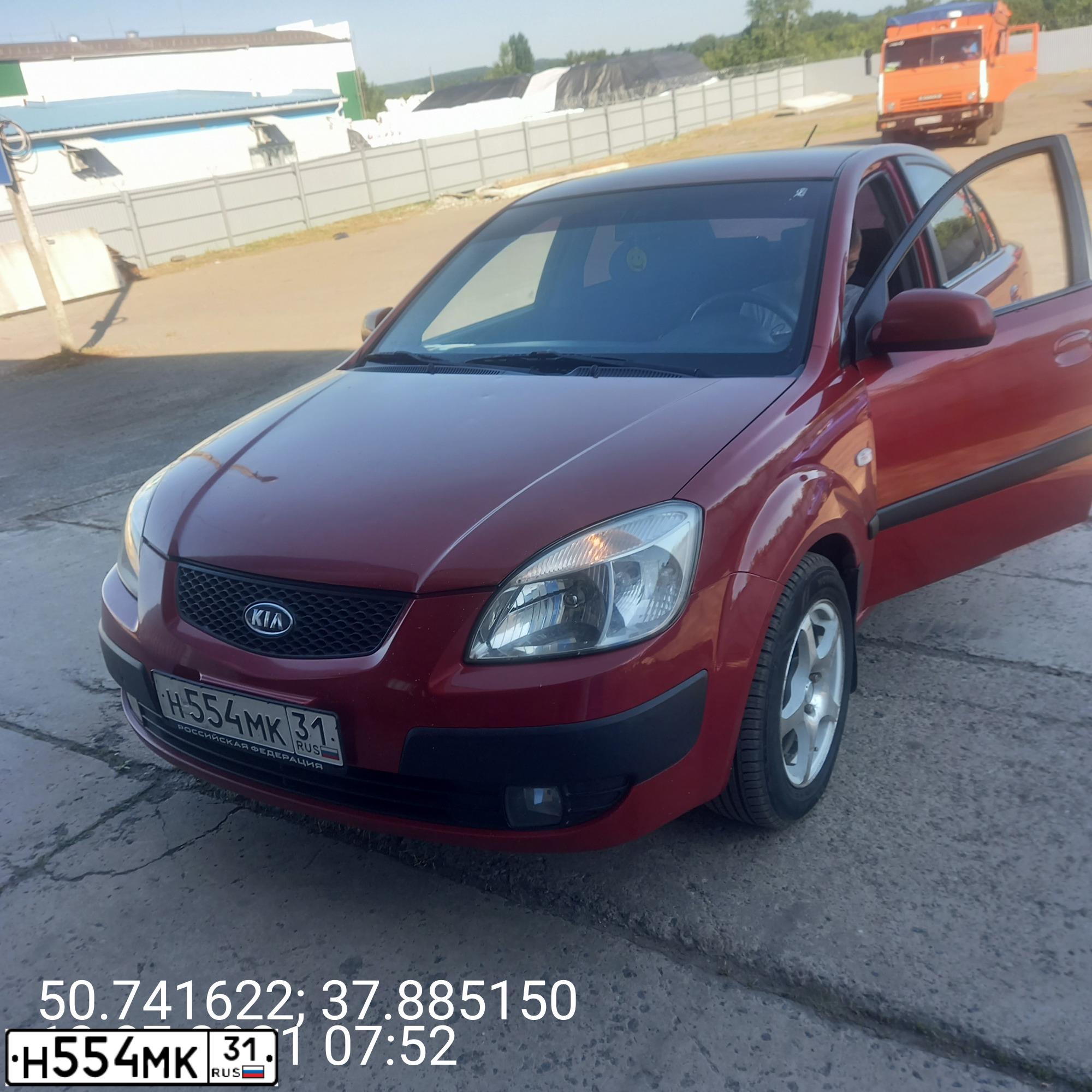 Фото автомобиля KIA RIO, 2007 — госномер Т175КР150. Цвет: ОРАНЖЕВЫЙ