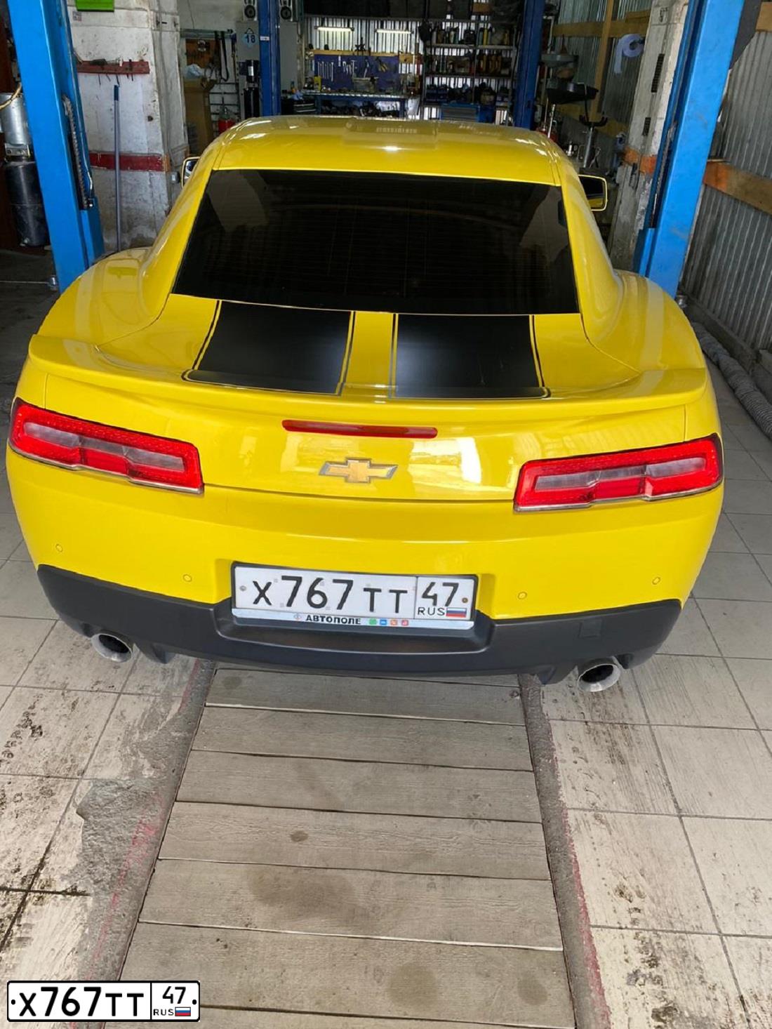 Фото автомобиля CHEVROLET CAMARO, 2014 — госномер Х767ТТ47. Цвет: ЯРКО-ЖЕЛТЫЙ