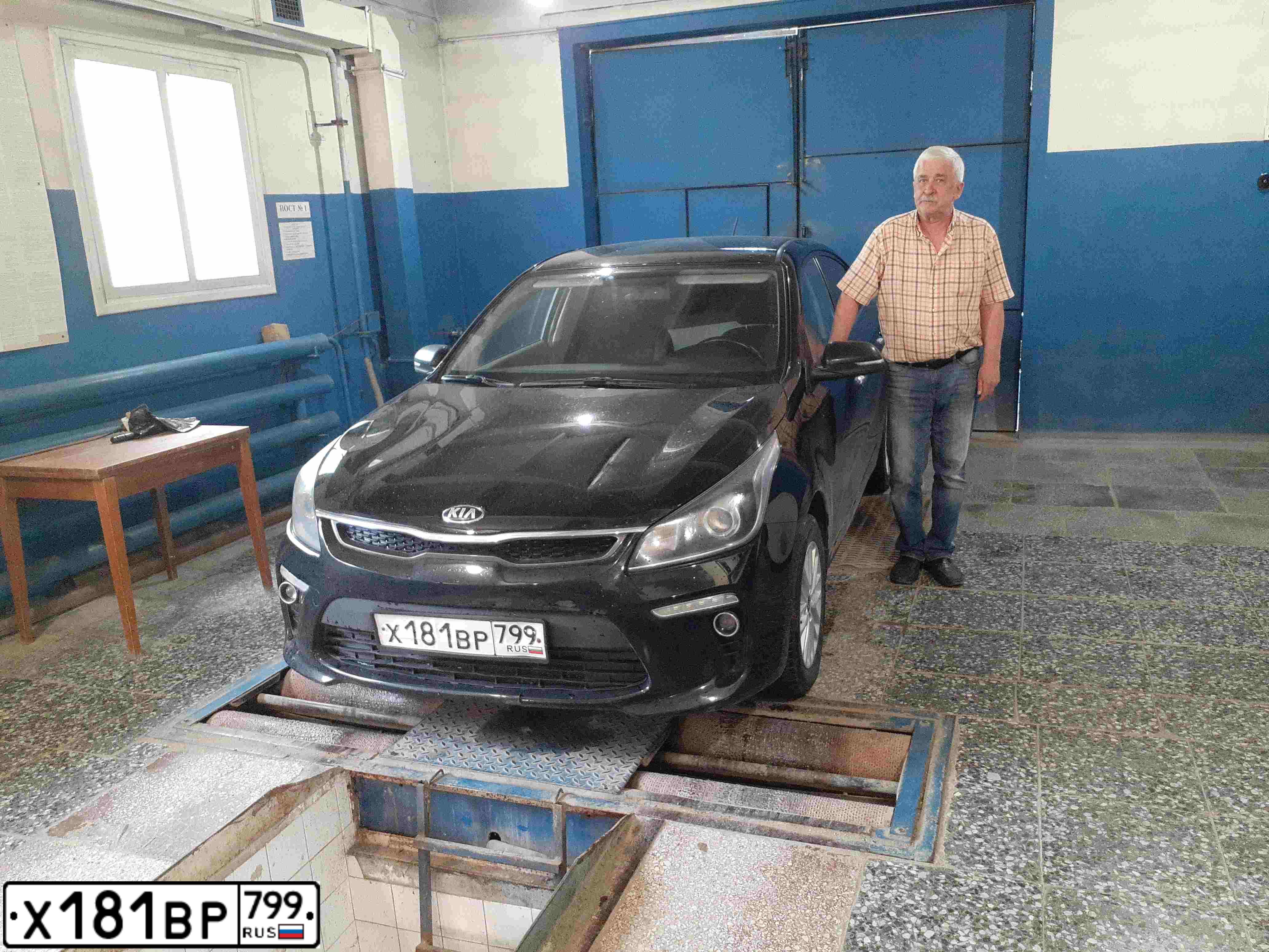 Фото автомобиля KIA RIO, 2017 — госномер Х462ЕУ05. Цвет: ЧЕРНЫЙ