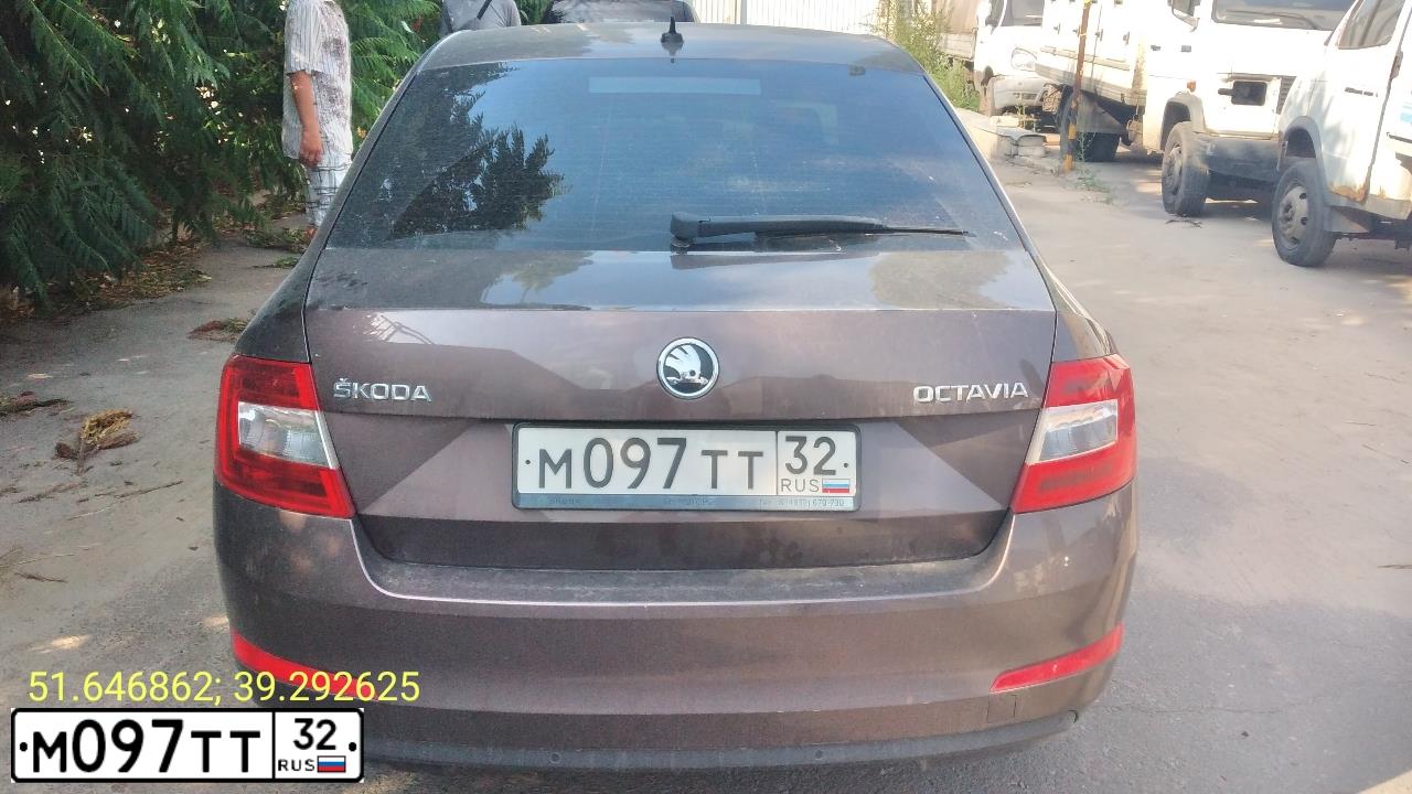 Фото автомобиля SKODA OCTAVIA, 2014 — госномер М097ТТ32. Цвет: Коричневый