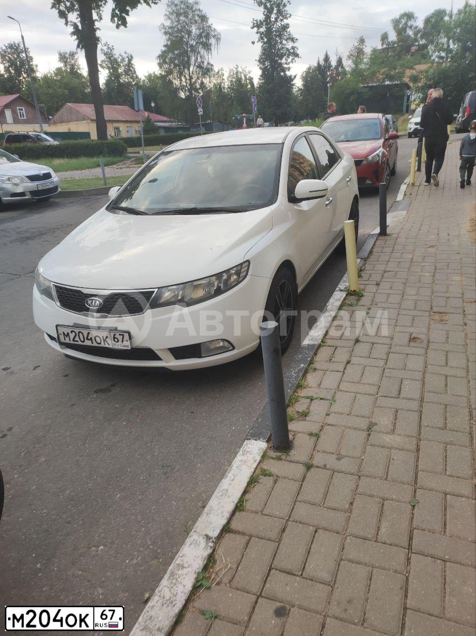 Фото автомобиля KIA CERATO, 2011 — госномер М155КВ50. Цвет: Белый