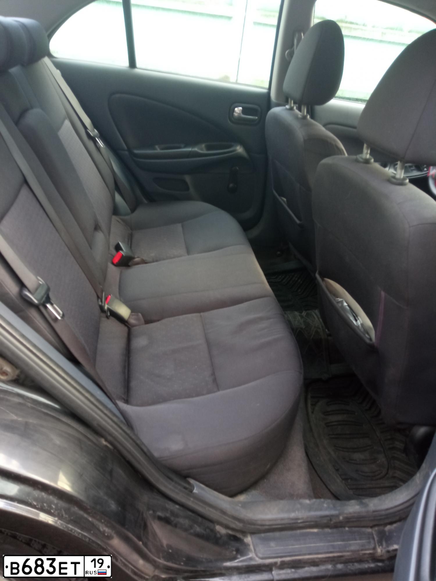 Фото автомобиля KIA CERATO, 2011 — госномер Е958ТН124. Цвет: ЧЕРНЫЙ