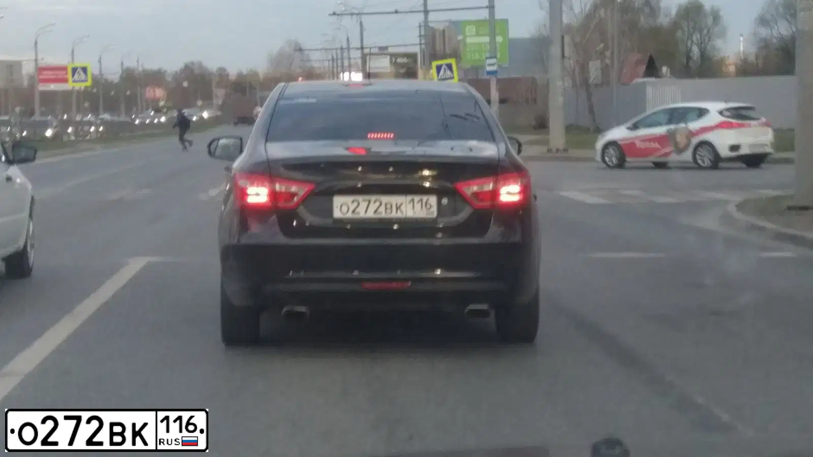 Фото автомобиля LADA VESTA, 2016 — госномер Р703РВ12. Цвет: ЧЕРНЫЙ