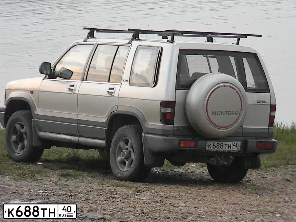 Фото автомобиля OPEL MONTEREY, 1997 — госномер О724СР62. Цвет: Серый