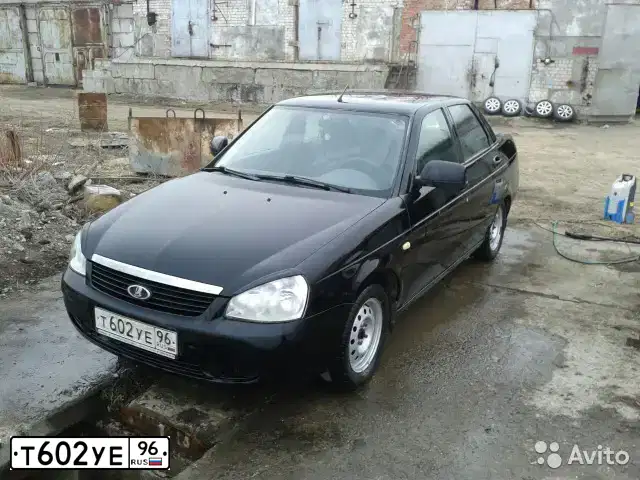 Фото автомобиля LADA 2170 PRIORA, 2011 — госномер Н194КН702. Цвет: Сине-Черный