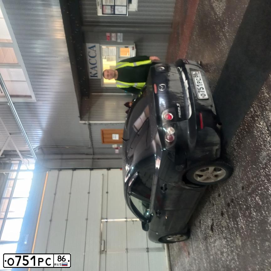 Фото автомобиля MAZDA 3, 2007 — госномер М708ТМ702. Цвет: ЧЕРНЫЙ