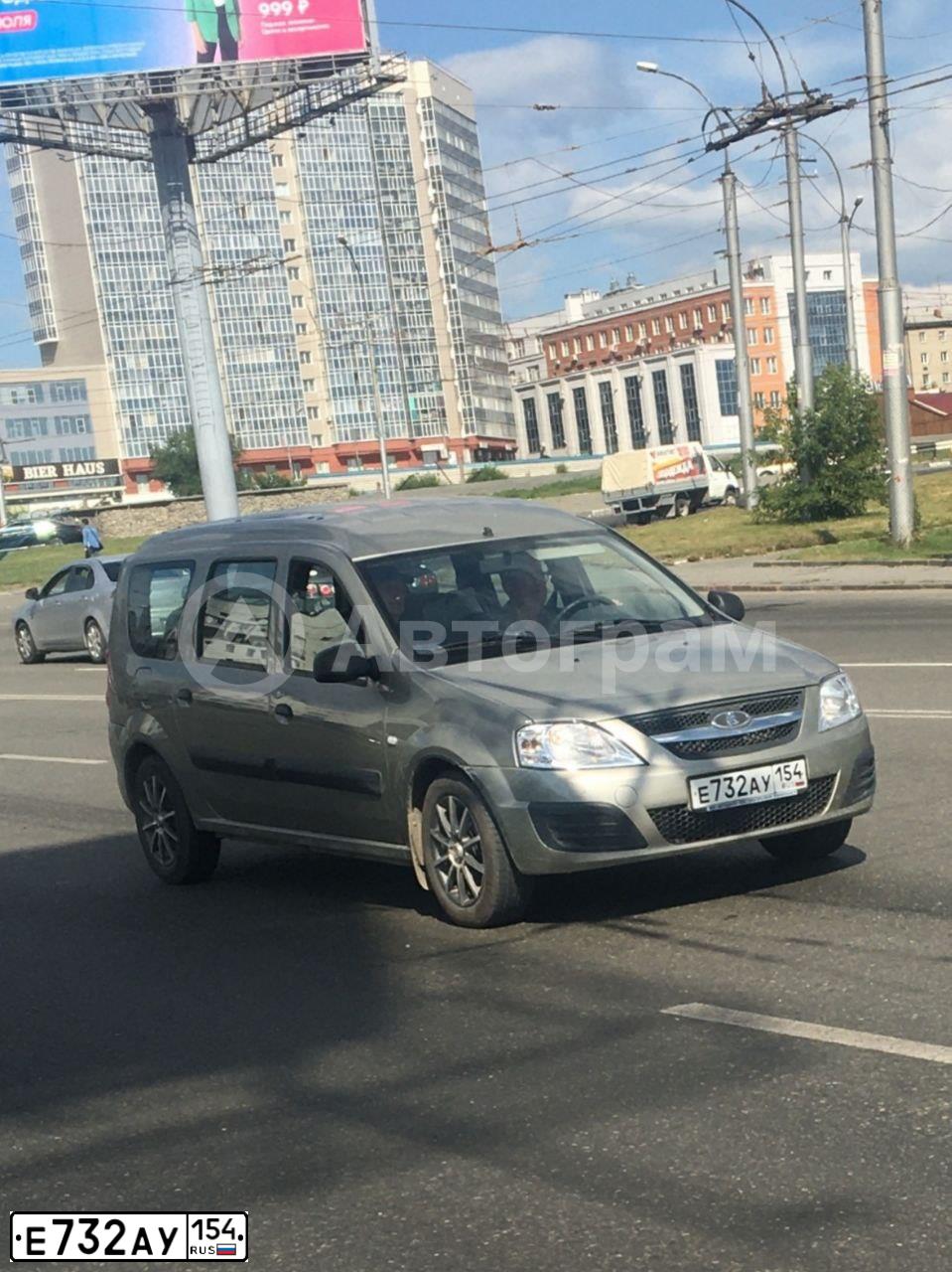 Фото автомобиля LADA LARGUS, 2014 — госномер Е732АУ154. Цвет: СЕРО БЕЖЕВЫЙ