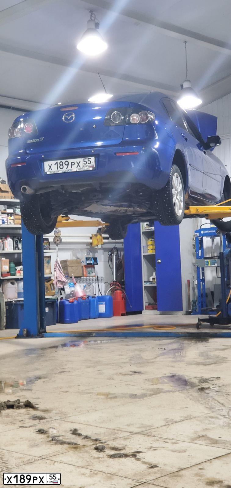 Фото автомобиля MAZDA A 3, 2007 — госномер Х189РХ55. Цвет: синий