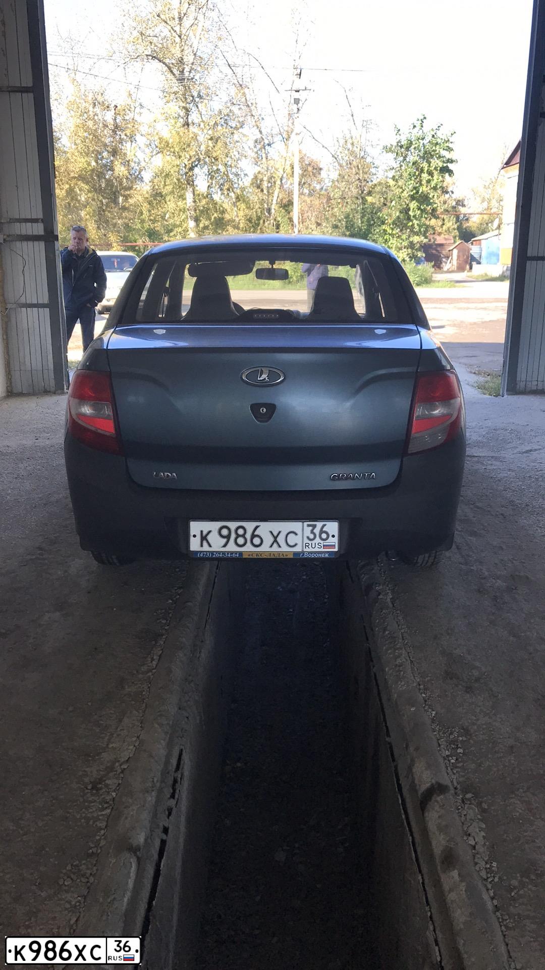 Фото автомобиля LADA 2190 GRANTA, 2014 — госномер К986ХС36. Цвет: СЕРО-СИНИЙ