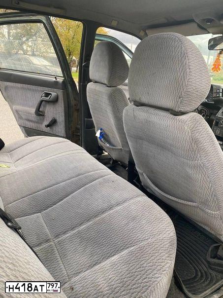 Фото автомобиля LADA 2110, 2003 — госномер О647ЕВ790. Цвет: Темно-зеленый