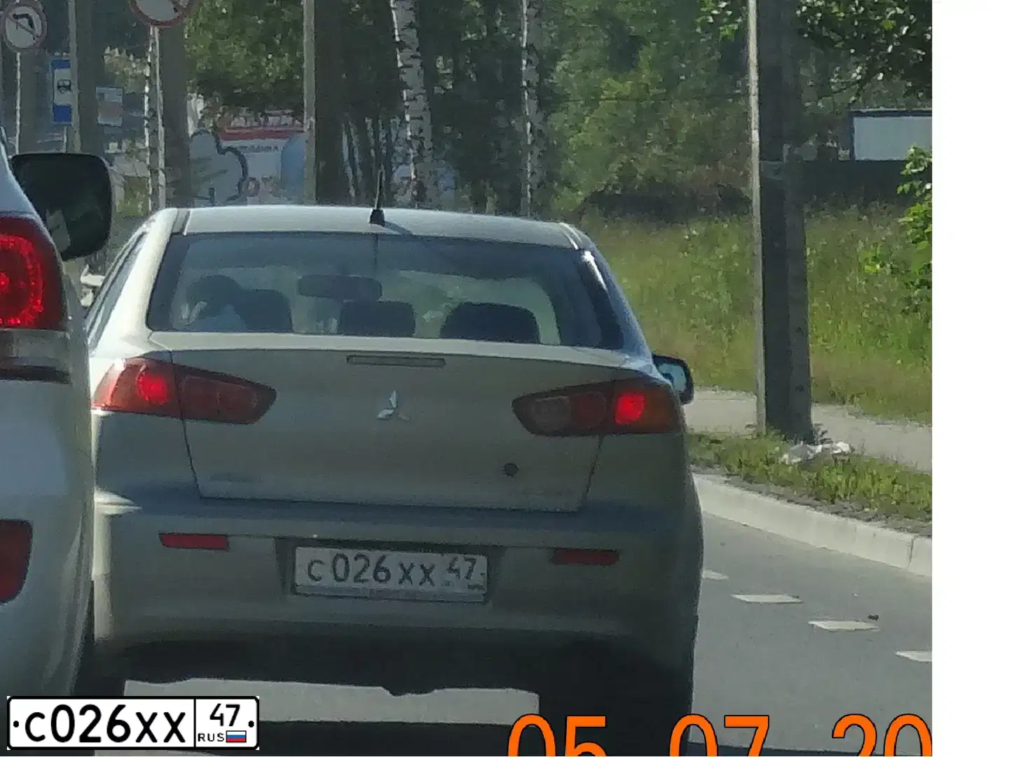 Фото автомобиля MITSUBISHI LANCER, 2008 — госномер С026ХХ47. Цвет: БЕЖЕВЫЙ