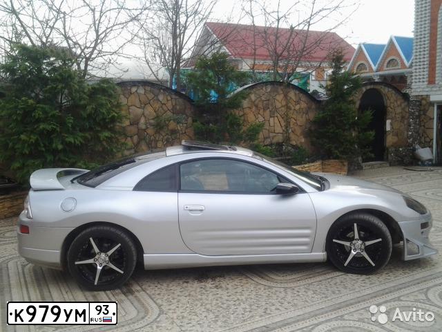 Фото автомобиля MITSUBISHI ECLIPSE, 1999 — госномер К979УМ93. Цвет: (БЕЛЫЙ)СЕРЕБРИСТЫЙ