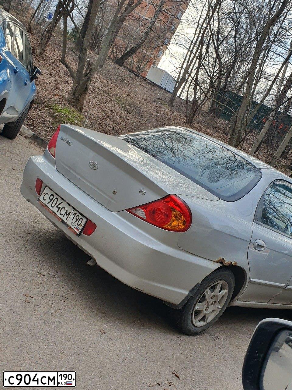 Фото автомобиля KIA SPECTRA, 2005 — госномер С904СМ190. Цвет: СЕРЫЙ