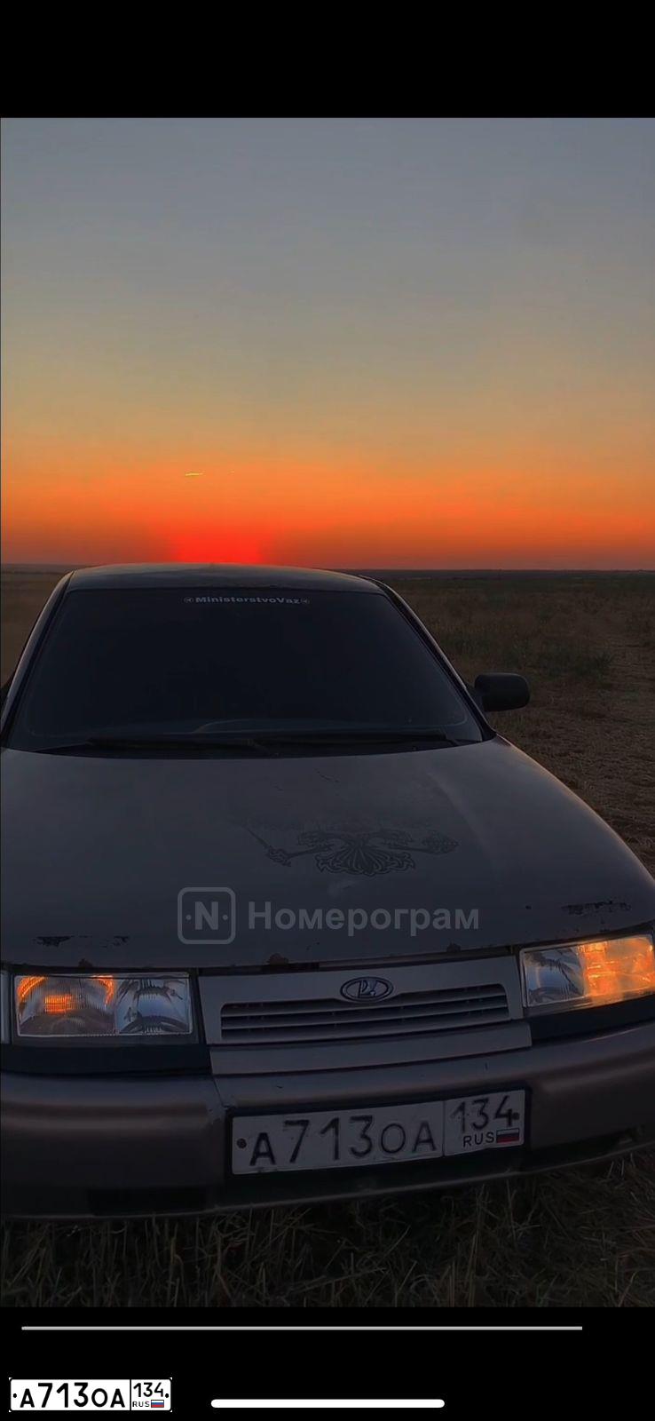Фото автомобиля LADA 2112, 2007 — госномер А713ОА134. Цвет: БЕЖЕВО-СИРЕНЕВЫЙ