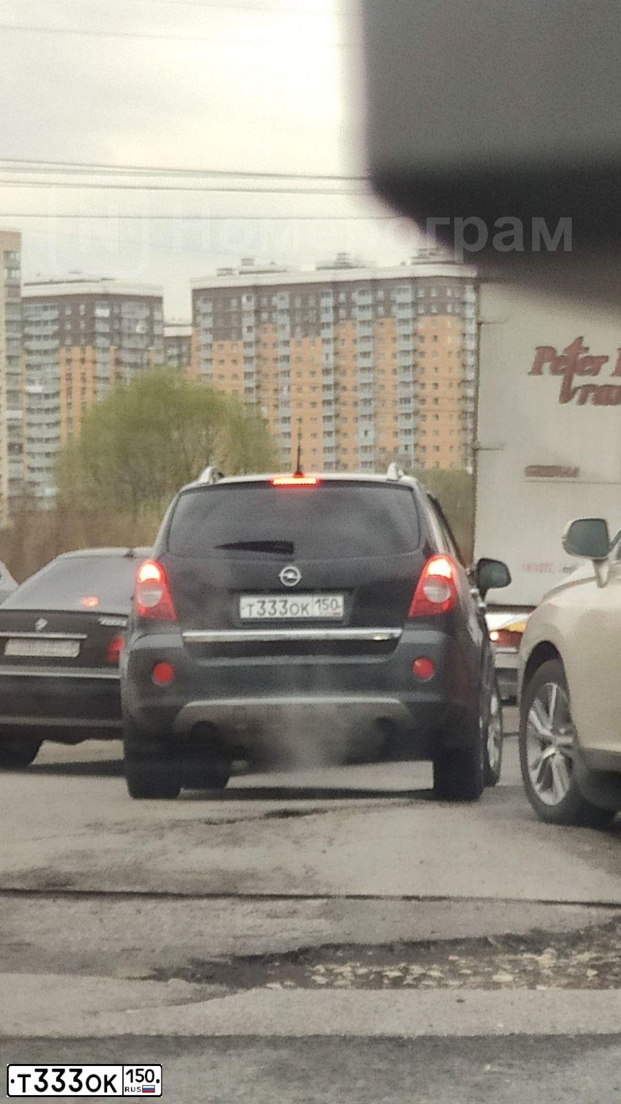 Фото автомобиля DODGE /GRAND/ CARAVAN, 2005 — госномер М593НО10. Цвет: СЕРО-ЗЕЛЕНЫЙ