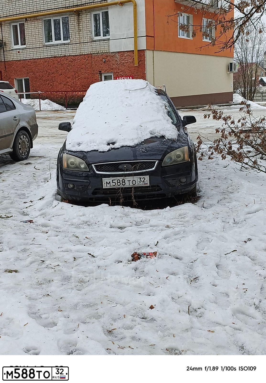 Фото автомобиля FORD FOCUS, 2007 — госномер М588ТО32. Цвет: ЧЕРНЫЙ