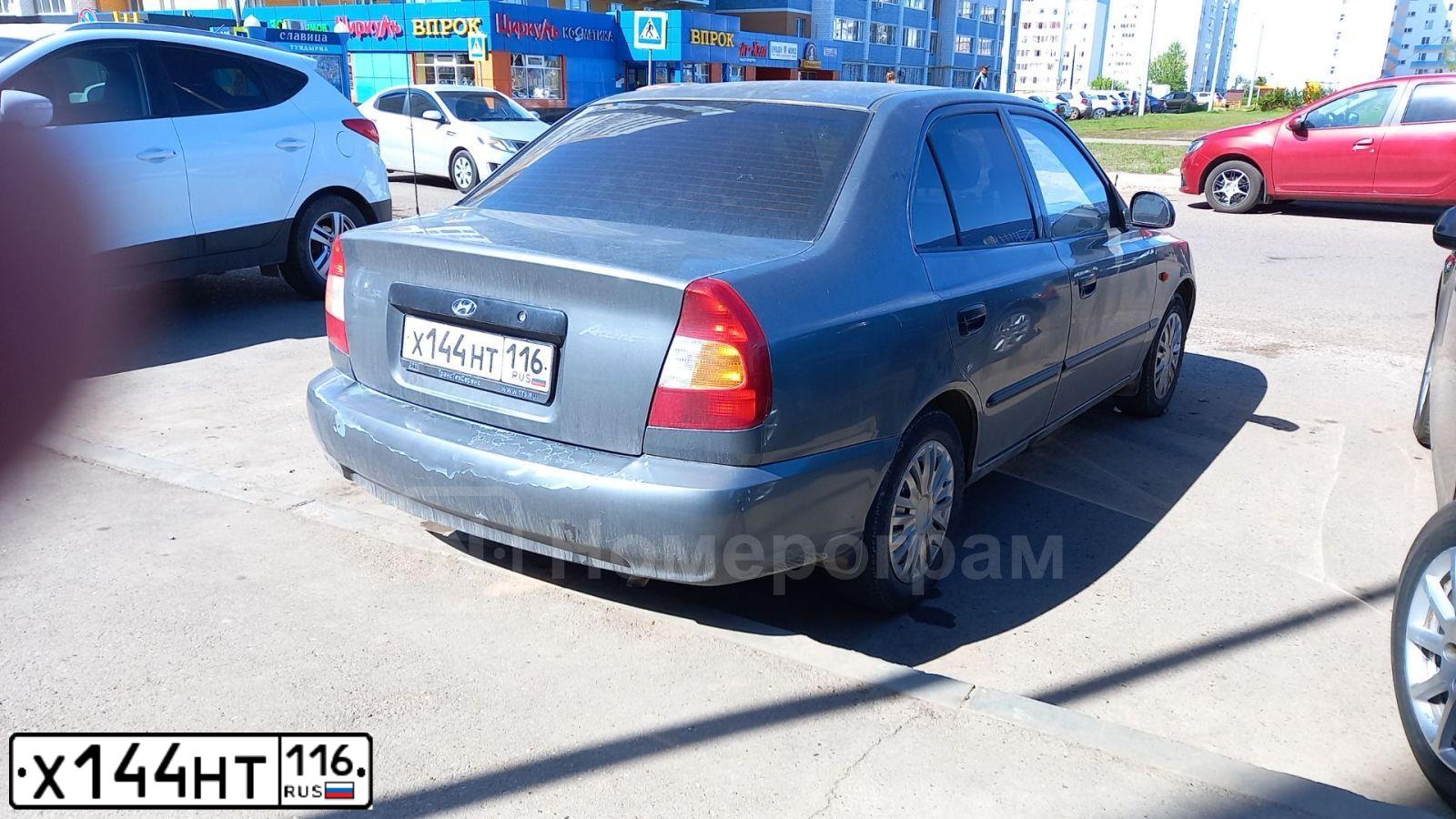 Фото автомобиля HYUNDAI ACCENT, 2008 — госномер Н449УА702. Цвет: СЕРЫЙ