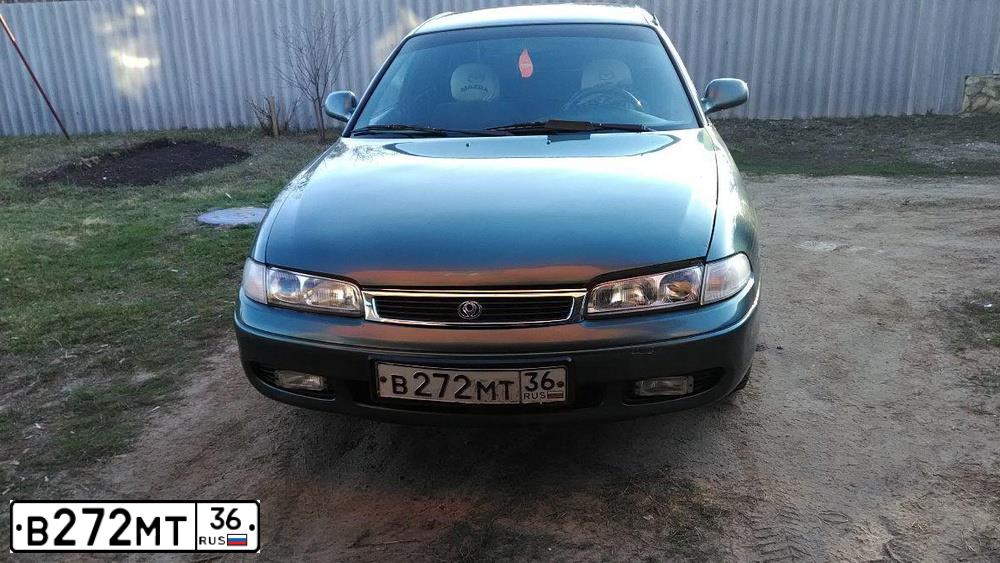 Фото автомобиля GAZ 3110 WOLGA, 1997 — госномер Р068СА36. Цвет: ЧЕРНЫЙ