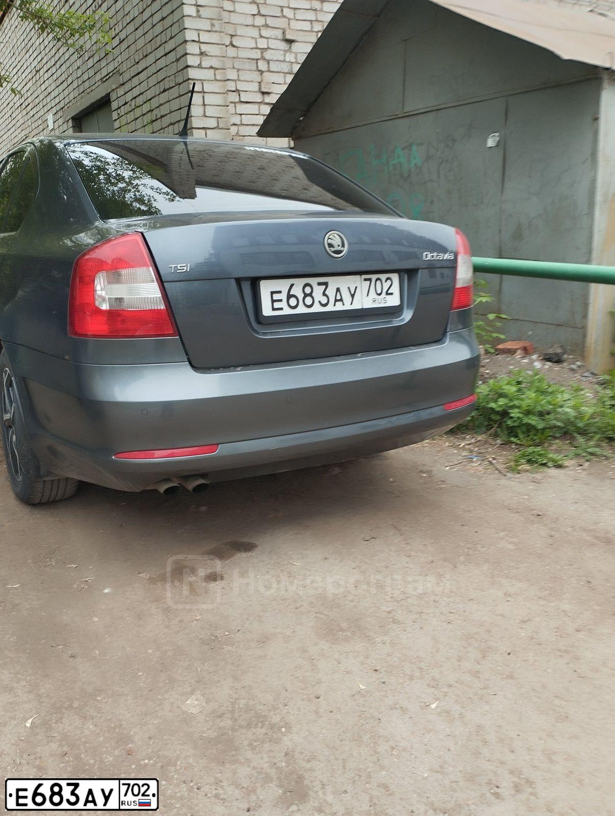 Фото автомобиля SKODA OCTAVIA, 2012 — госномер Е683АУ702. Цвет: ТЕМНО-СЕРЫЙ