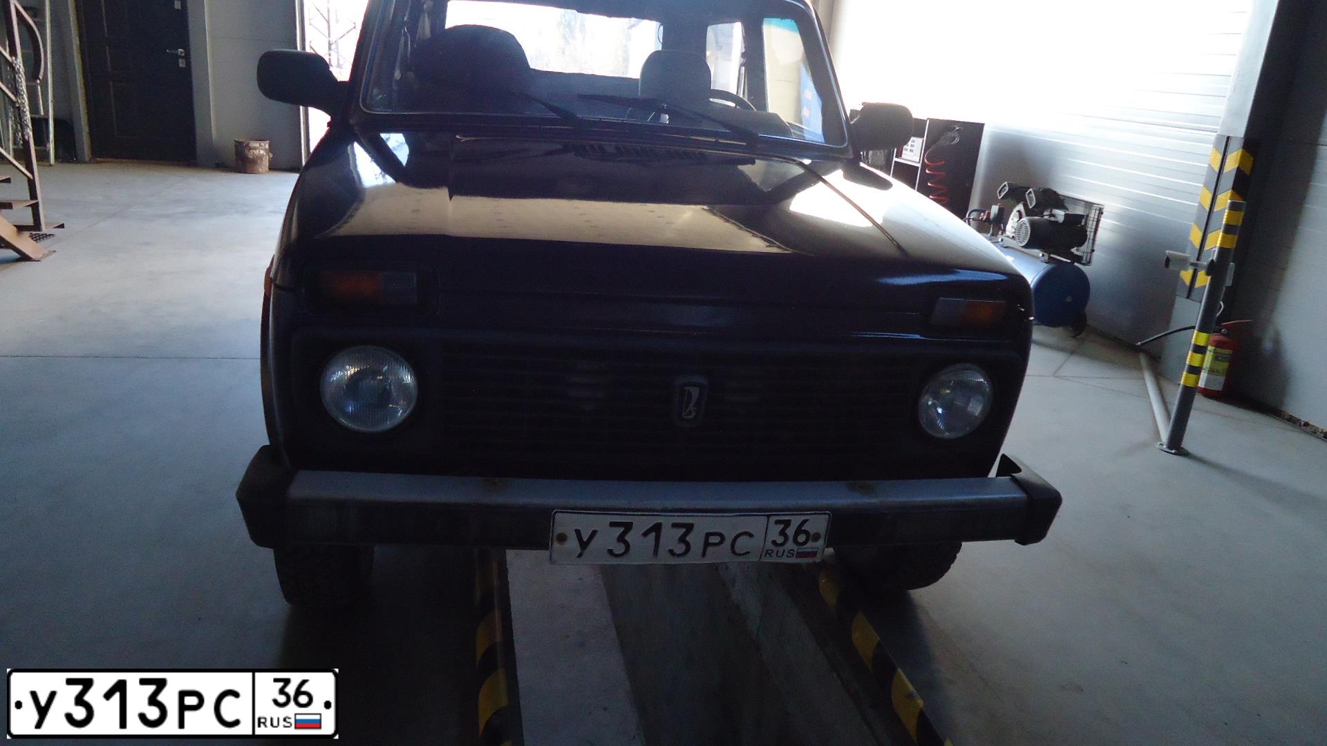 Фото автомобиля LADA 2121 NIVA, 2001 — госномер Е449СА99. Цвет: ФИОЛЕТОВЫЙ