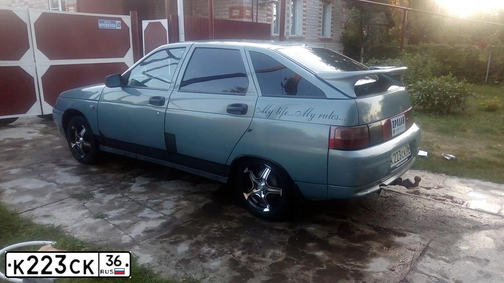 Фото автомобиля LADA 2112 LADA, 2003 — госномер Н467НН36. Цвет: ЗОЛОТИСТО-СЕРЫЙ