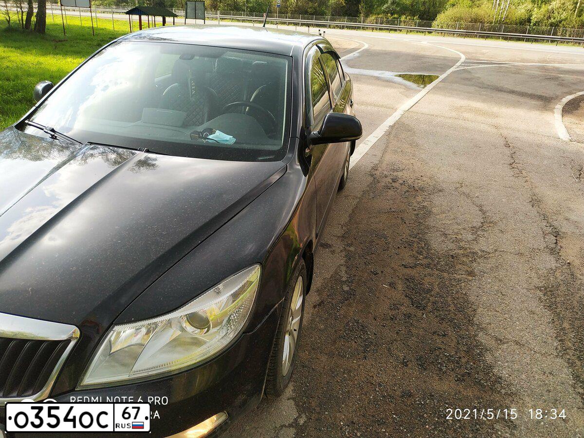 Фото автомобиля SKODA OCTAVIA, 2011 — госномер О354ОС67. Цвет: ЧЕРНЫЙ