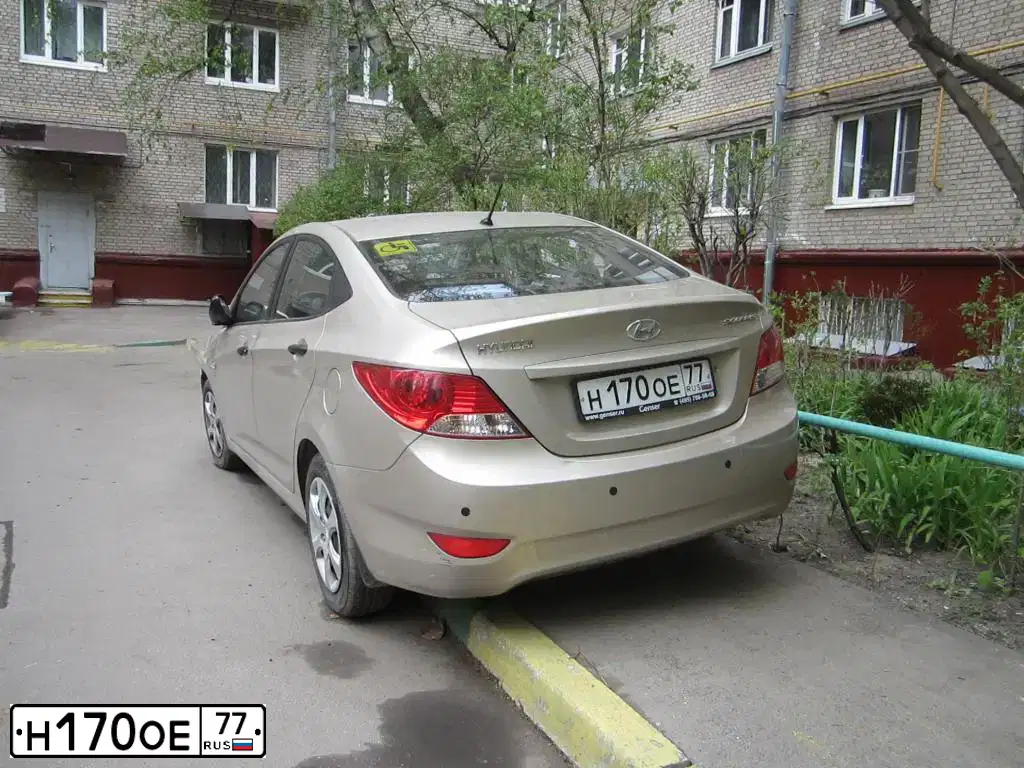 Фото автомобиля LADA 2105, 1996 — госномер Н170ОЕ77. Цвет: БЕЛЫЙ