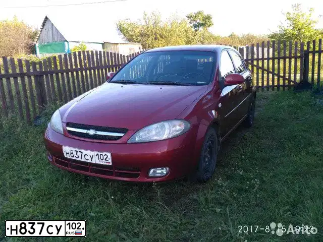 Фото автомобиля CHEVROLET LACETTI, 2006 — госномер М094РТ18. Цвет: Красный