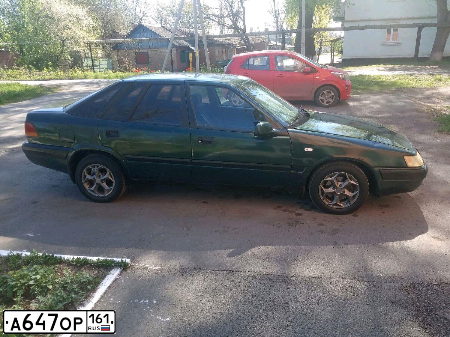 Фото автомобиля DAEWOO ESPERO, 1998 — госномер А647ОР161. Цвет: ЗЕЛЕНЫЙ