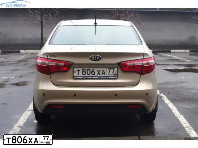 Фото автомобиля KIA RIO, 2013 — госномер Е913УК35. Цвет: БЕЖЕВЫЙ