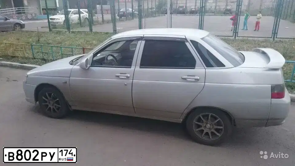 Фото автомобиля ВАЗ 21101, 2005 — госномер В912ТА702. Цвет: Серебристо-Желтый