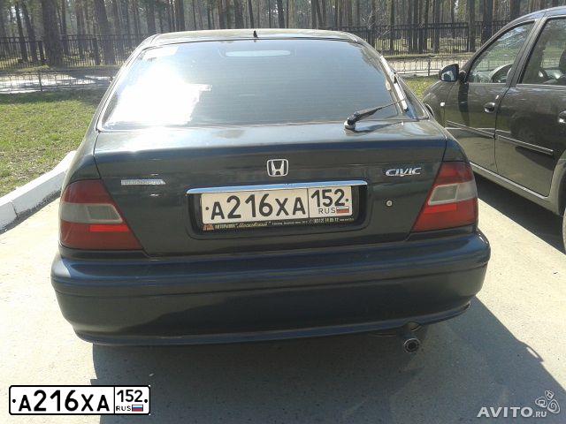 Фото автомобиля HONDA CIVIC, 1999 — госномер Т703РВ52. Цвет: ЧЕРНЫЙ