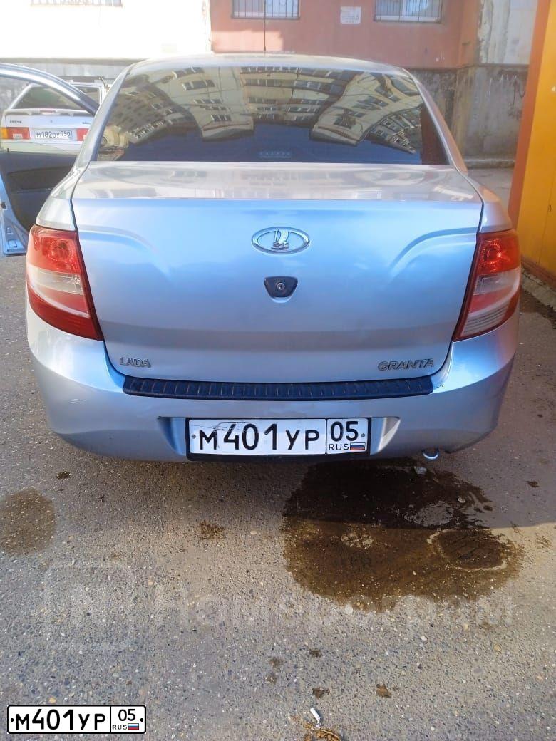 Фото автомобиля LADA 2190 GRANTA, 2012 — госномер М401УР05. Цвет: голубой