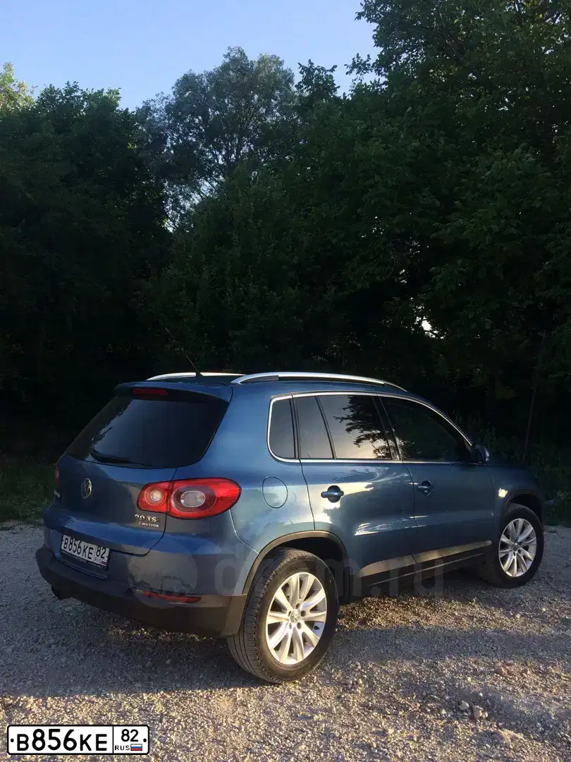 Фото автомобиля VOLKSWAGEN TIGUAN, 2011 — госномер А594СК92. Цвет: синий