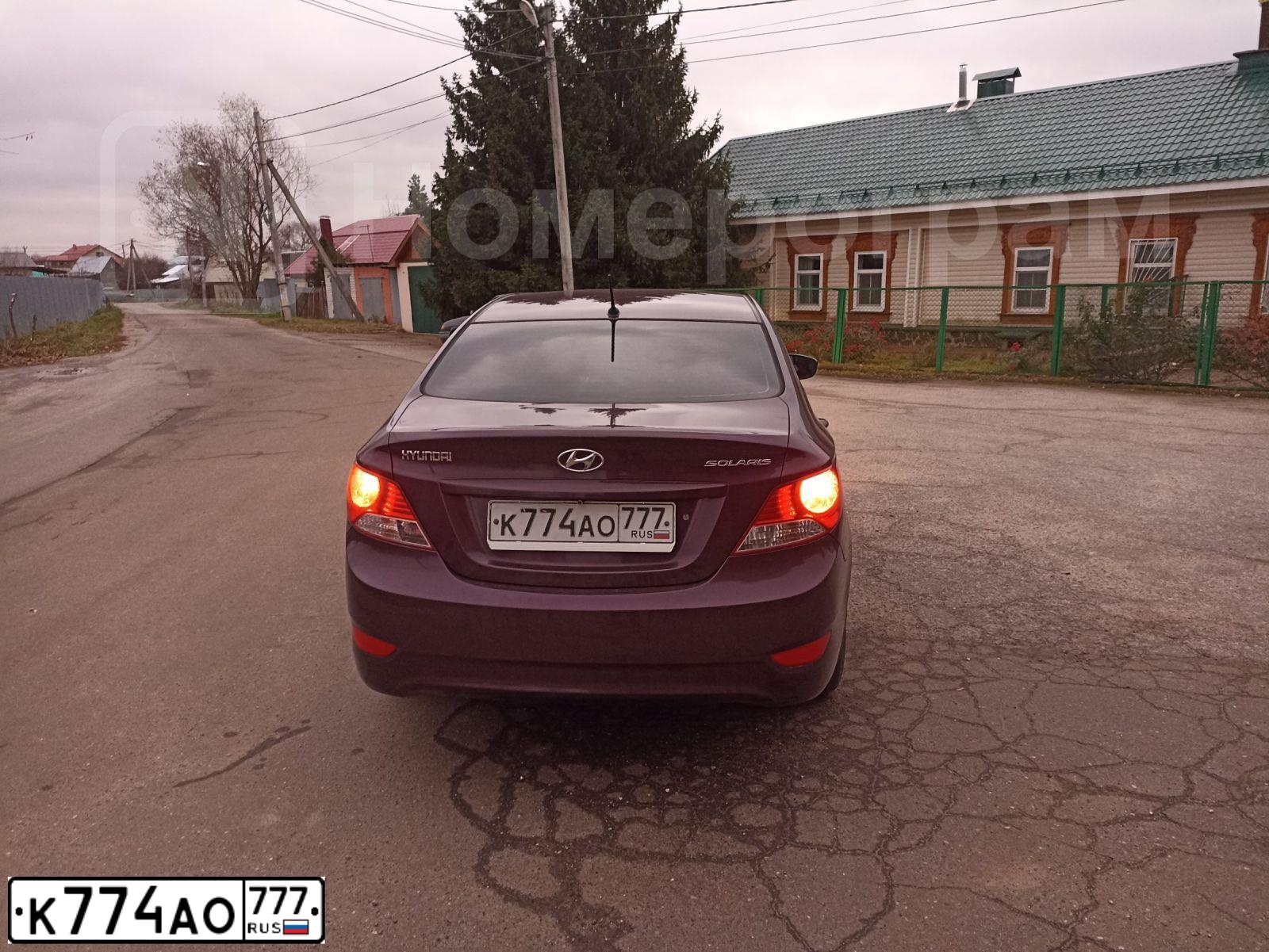 Фото автомобиля HYUNDAI SOLARIS, 2013 — госномер Р775РУ790. Цвет: ФИОЛЕТОВЫЙ