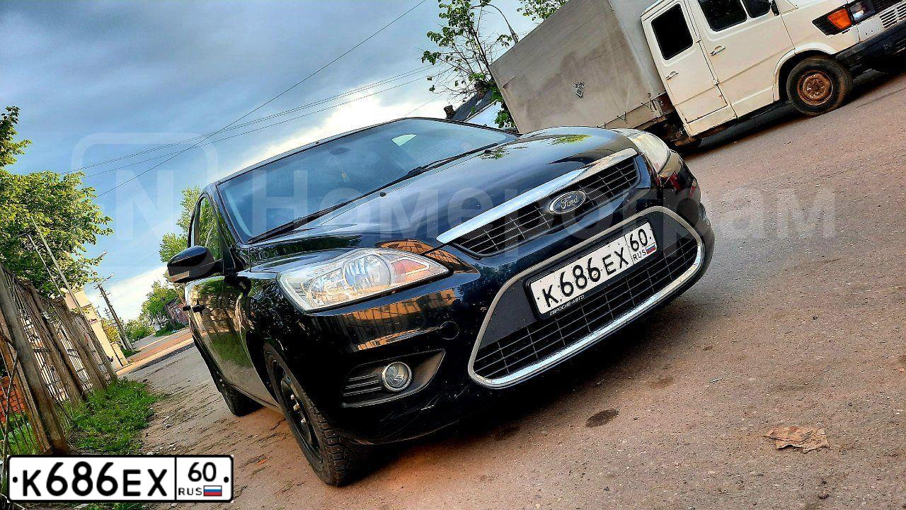 Фото автомобиля FORD FOCUS, 2008 — госномер К686ЕХ60. Цвет: ЧЕРНЫЙ