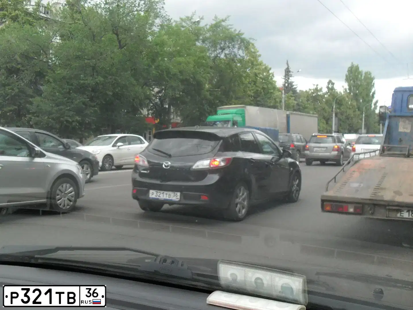 Фото автомобиля MAZDA 3, 2010 — госномер Т958СХ36. Цвет: ЧЕРНЫЙ