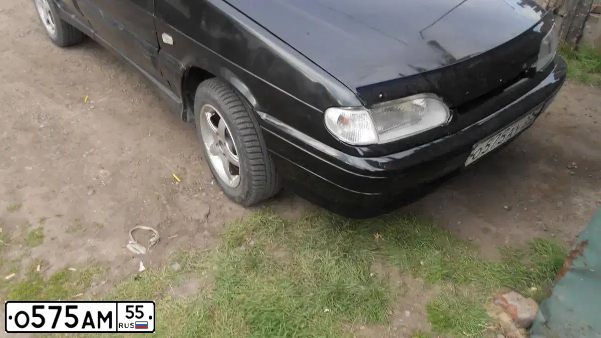 Фото автомобиля MITSUBISHI LANCER, 2008 — госномер О585АМ55. Цвет: БЕЖЕВЫЙ