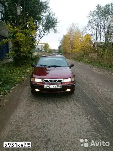 Фото автомобиля DAEWOO NEXIA, 2007 — госномер К324УТ164. Цвет: ВИШНЕВЫЙ