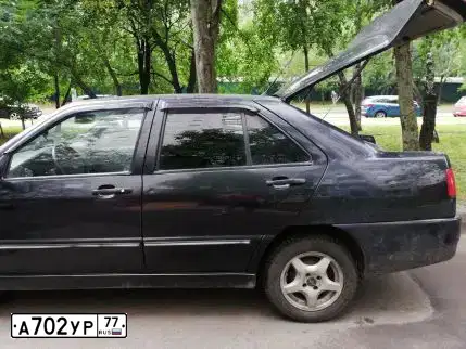 Фото автомобиля OPEL ASTRA, 2012 — госномер А702УР77. Цвет: СИНИЙ