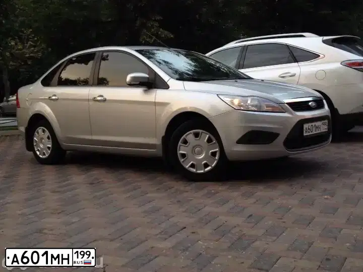 Фото автомобиля FORD FOCUS, 2008 — госномер Т299ХК31. Цвет: СЕРЕБРИСТЫЙ