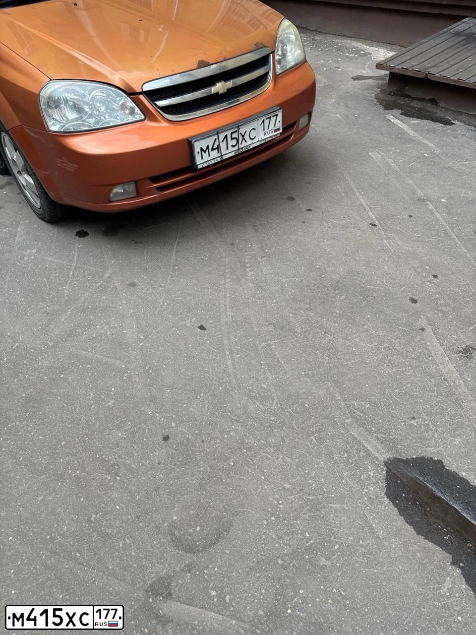 Фото автомобиля CHEVROLET LACETTI, 2007 — госномер М415ХС177. Цвет: ОРАНЖЕВЫЙ