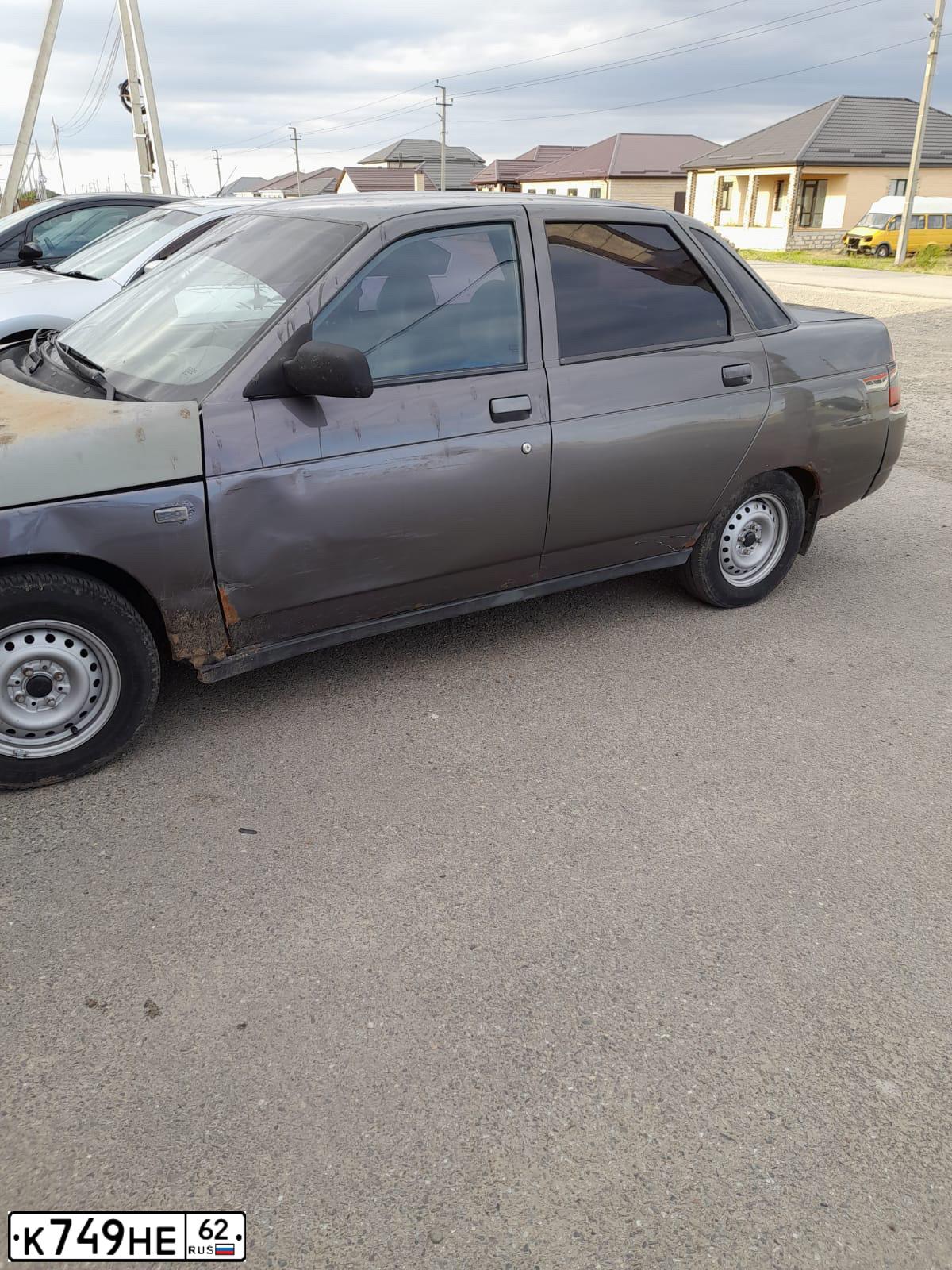 Фото автомобиля LADA 2110, 2004 — госномер Е709НХ08. Цвет: ТЕМНО-СЕРО-БЕЖЕВЫЙ