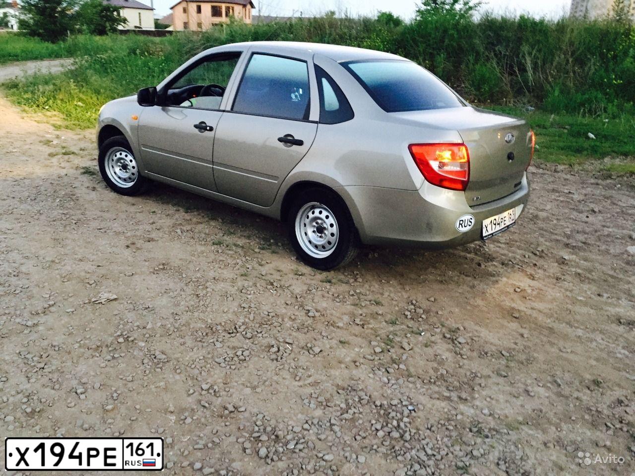 Фото автомобиля LADA GRANTA, 2013 — госномер У903МО761. Цвет: СЕРО-БЕЖЕВЫЙ