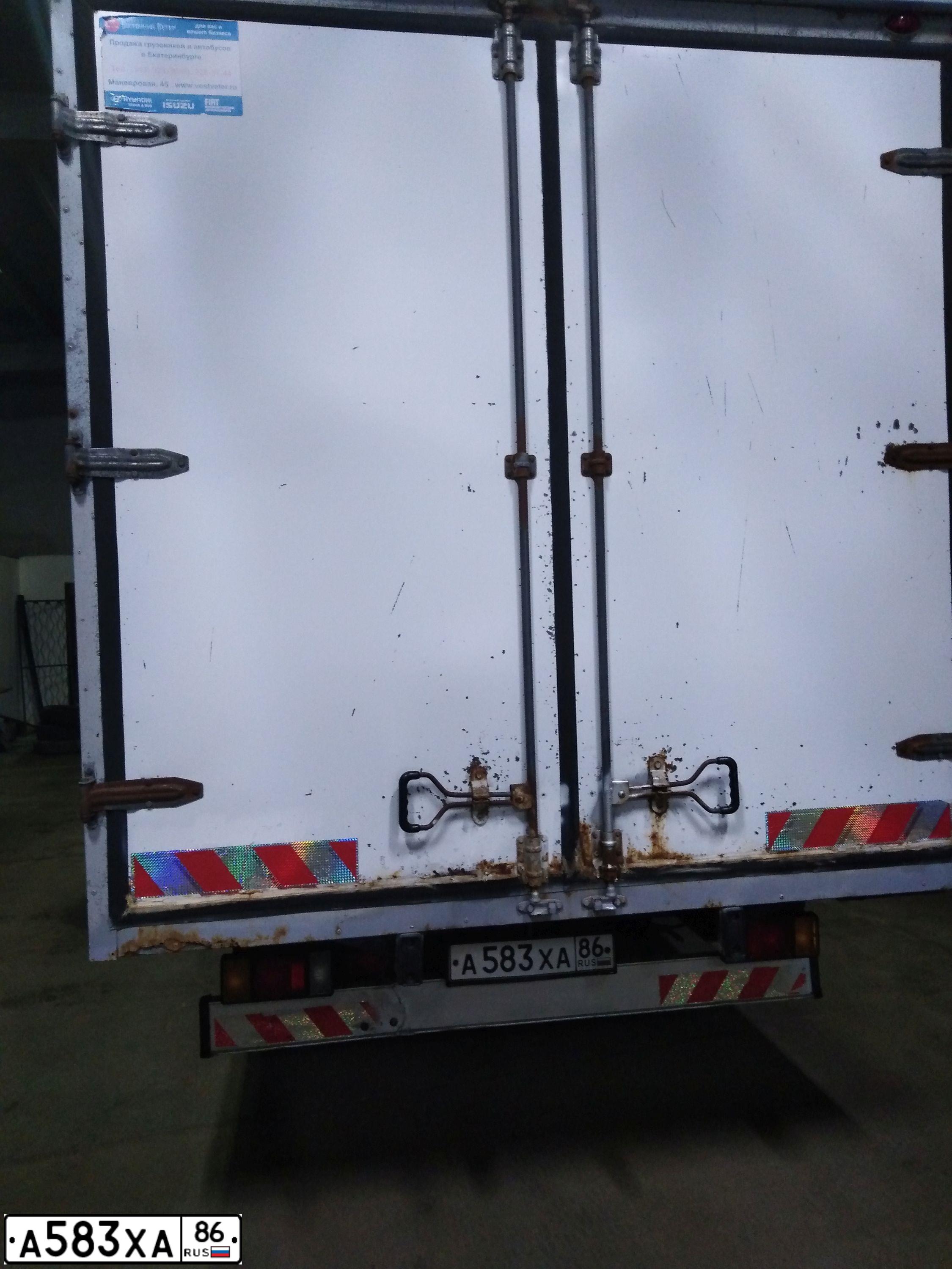Фото автомобиля ISUZU 3844AA, 2011 — госномер Х400НЕ72. Цвет: Белый